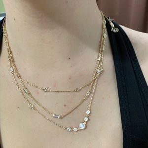 Kendra Scott necklace.